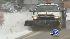 Caltrans crew clear snow from Interstate 5 through the Grapevine.
