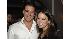 Reality television stars Rob Mariano, left, and...