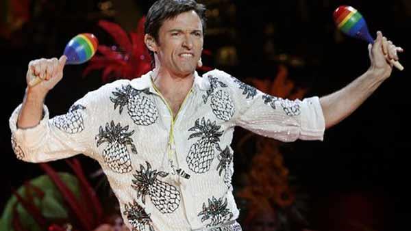 Hugh Jackman performs with cast from the musical 'The Boy from Oz' during a photocall at the Sydney Entertainment Center Wednesday, Aug. 2, 2006.