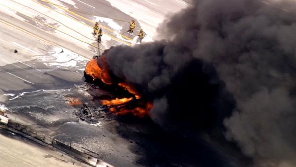 A tanker truck overturned and exploded on the 91 Freeway in Corona on Friday, shooting flames over 100 feet in the air.