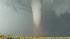 Storm chasing raw: Tornado swirling :: Hails pounds the truck Dallas Raines was driving in as he watches a tornado in the distance.