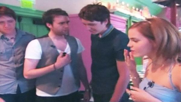 Oliver Phelps (George Weasley), Matthew Lewis (Neville Longbottom), James Phelps (Fred Weasley) and Emma Watson (Hermione Granger) try candy at 'The Wizarding World of Harry Potter,' which opened at Universal Studios in Orlando, Florida on June 18, 2010.