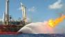 Robots began working on removing and replacing a faulty cap over the gushing oil well on the floor of the Gulf Saturday.