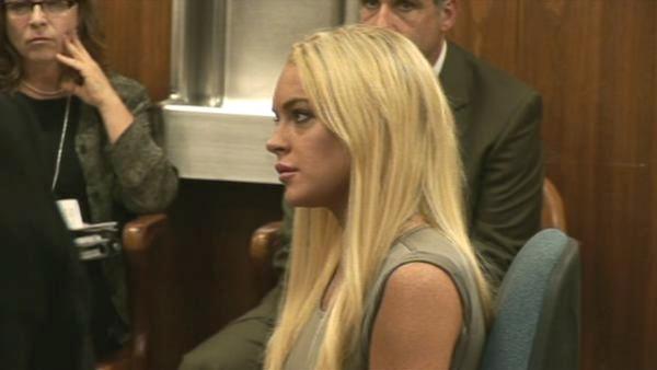 Lindsay Lohan reports to jail to begin serving a 90-day sentence for violating the terms of her probation.