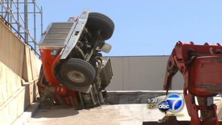 A cement truck was flipped on its nose, spilling cement and fuel into a Little Tokyo business on Saturday. The truck was backing onto a ramp leading to the roof of a business in Little Tokyo when the ramp collapsed.