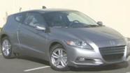 Car enthusiasts say the new Honda CR-Z is a new kind a hybrid thats a bit like a sports car.