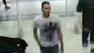 A man tried to take a picture of a woman inside a changing room with his cell phone by sneaking it under the door.