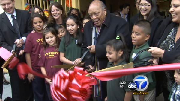 Quincy Jones cuts ribbon at namesake school