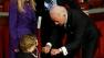 Vice President Bidens negotiating skills paid off for him when a 3-year-old son of a senator snatched Bidens script away.