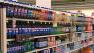 A grocery aisle stocked with various soda drinks are shown in this undated file photo. A new study found that people who drank more than one sugar-sweetened drink each day had high sugar and calorie consumption as well as higher body mass indexes.