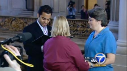 A same-sex couple is seen getting married in this undated file photo.