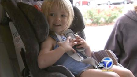 A child is shown sitting in a car seat in this undated file photo.