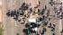 Angelenos filled the streets of downtown Los...