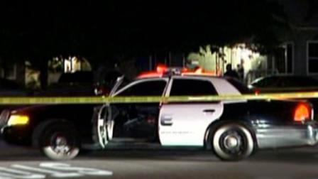 Police investigate the scene on an officer-involved shooting in Fontana on Monday, May 9, 2011.