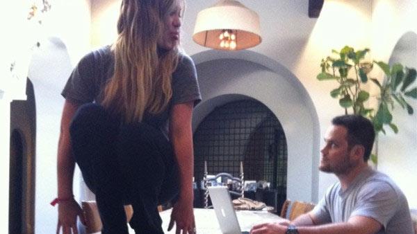 Hilary Duff and her husband Mike Comrie appear in a photo posted on the actress' official Twitter page on July 15, 2011.