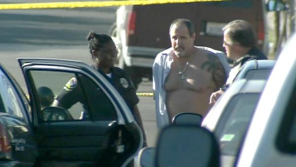 The suspect, believed to be the sole shooter, was taken into custody about a half-mile from the crime scene as he was driving southeast in a residential area toward Huntington Beach.