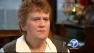 The mother of Jerry Sanduskys adopted son said she had her suspicions about Sandusky, who is accused of sexual abuse.