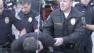 Three people were arrested as police moved in to clear the Occupy encampment in downtown Riverside on Wednesday.