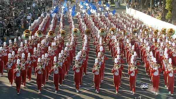 The Arcadia High School marching band passes the crowd on Orange Grove Boulevard during the 123rd annual Rose Parade in Pasadena Jan. 2, 2012.