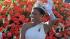 Rose Queen Drew Washington waves to the crowd on...