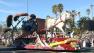 The Kiwanis float passes the crowd on Colorado Boulevard during the 123rd annual Rose Parade in Pasadena Jan. 2, 2012.
