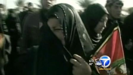 At least 53 people were killed by a bomb that tore through a Shiite holy day procession in Iraq on Saturday.
