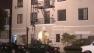 Police searched an apartment building in connection to the investigation of human body parts found in the Hollywood Hills.