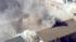 Firefighters are battling a fire at a house...