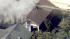 Firefighters are battling a fire at a house...
