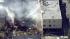 After the flames were knocked down, a body was...