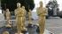 Oscar red carpet rolled up; cleanup crews out :: Giant Oscars statues appear in this undated file photo.