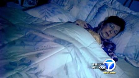 A woman is seen sleeping in this file photo.