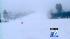 Snow is falling heavily in the mountains with...