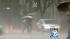 San Gabriel Valley hit w/ hail, intense rain :: People are seen walking in the rain April 13, 2012.