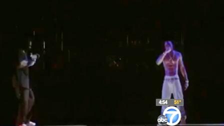 Rapper Snoop Dogg is seen performing with a hologram of late rapper Tupac Shakur at the first weekend of Coachella Sunday, April 15, 2012.