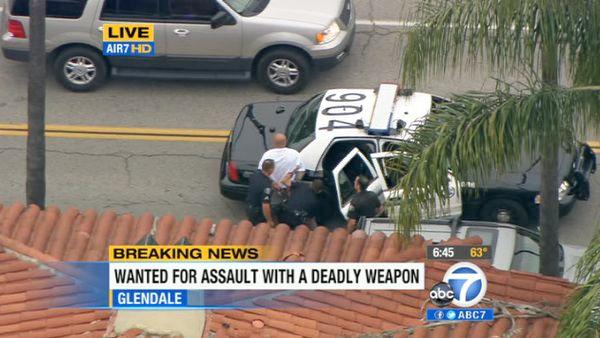 The driver surrendered to LAPD officers at 6:45 p.m. on a Glendale side street. Officers approached him with guns drawn. He was handcuffed without incident. The driver was later identified as 31-year-old Ambartsum Sarkisyan.