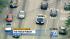 The tow truck driver pulled a U-turn in busy...
