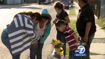 Family and friends of Jose and Anjelica Arreola are seen gathering at a rally at Ritter Elementary School on Friday, April 27, 2012.