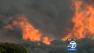 A wildfire is seen burning in this undated file photo.