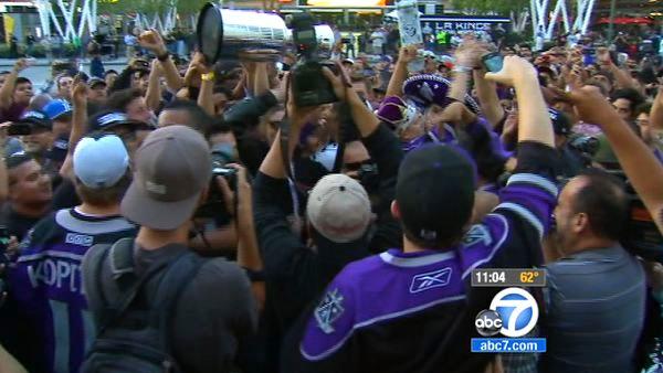 LA Kings fans are seen celebrating the team's Stanley Cup victory outside the Staples Center on Monday, June 11, 2012.