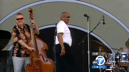 Bill Cosby (center) is seen on stage at the Playboy Jazz Festival in this undated file photo. Cosby will no longer host the event after 30 years.