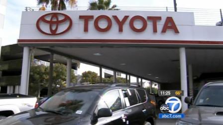 Cars are seen outside a Toyota dealership in this undated file photo.