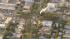 Crews are seen at the site of a small plane...