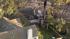 A small plane is seen after it crashed in...