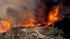 A brush fire is seen burning in the Sepulveda...