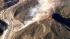 A brush fire is seen burning in the Sepulveda...