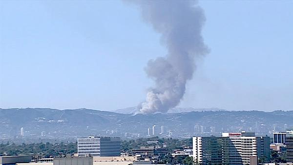 Smoke is seen from LAX after a brush fire burned in the Sepulveda Pass near the 405 Freeway at Getty Center Drive on Friday, September 14, 2012.