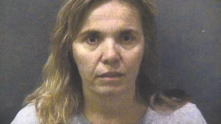 An Orange County hockey mom has been charged with sexually assaulting two boys on her sons hockey team.