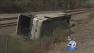 A tour bus with a sign that reads, Da Zhen Bus, overturned while traveling on the eastbound 210 Freeway in Irwindale on Thursday,  Aug. 22, 2013. Approximately 50 people were injured in the crash.