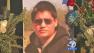 Flowers surround a photo of Nathaniel Mota, who was struck and killed in a hit-and-run crash in South Los Angeles on Friday, Sept. 13, 2013.